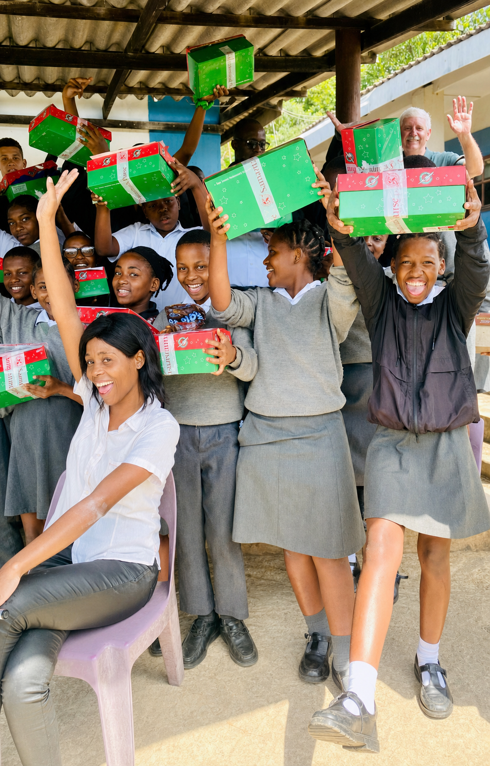 Hibberdene Academy learners celebrating a Christmas shoebox distribution